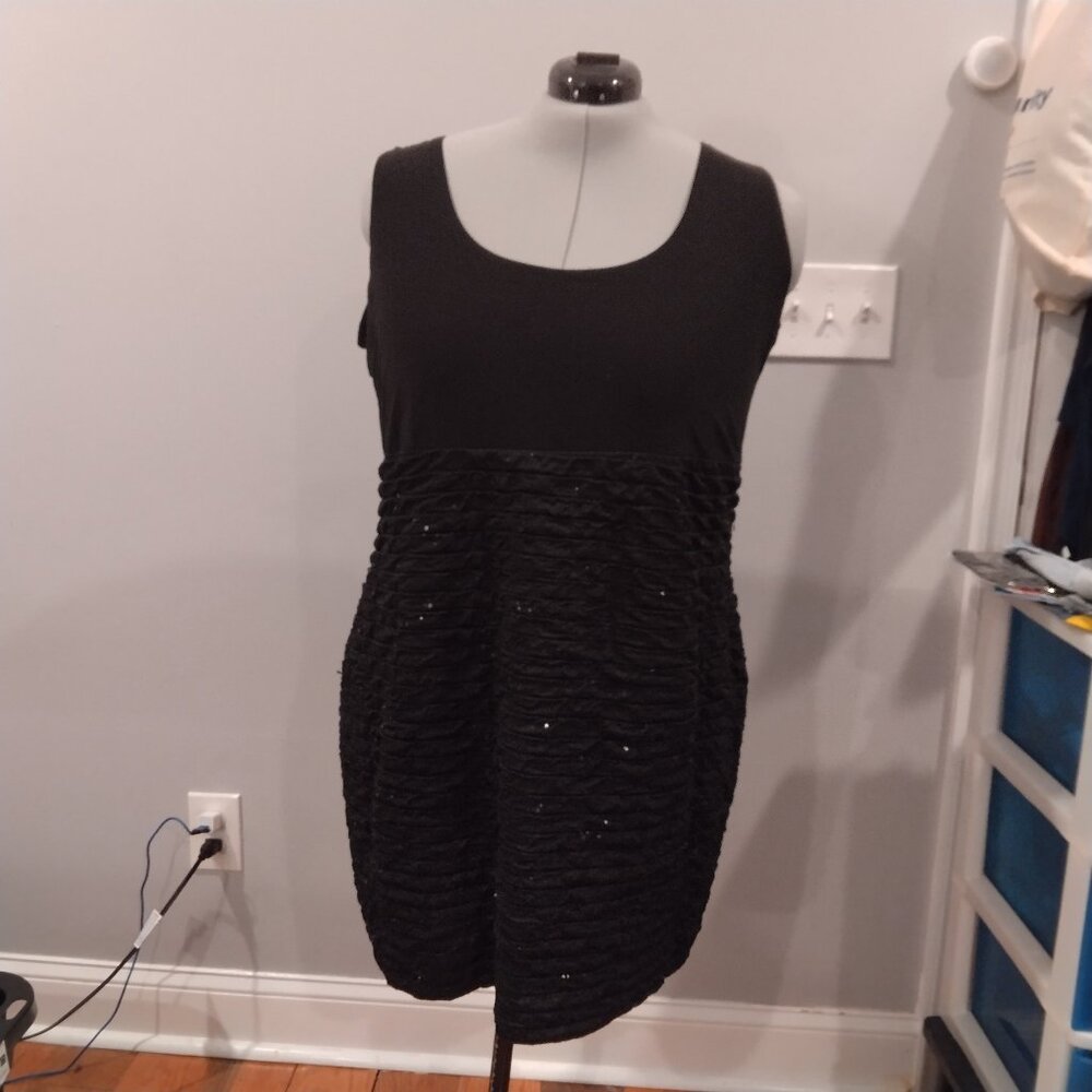 Dots  Black dress with sparkly dots at the bottom